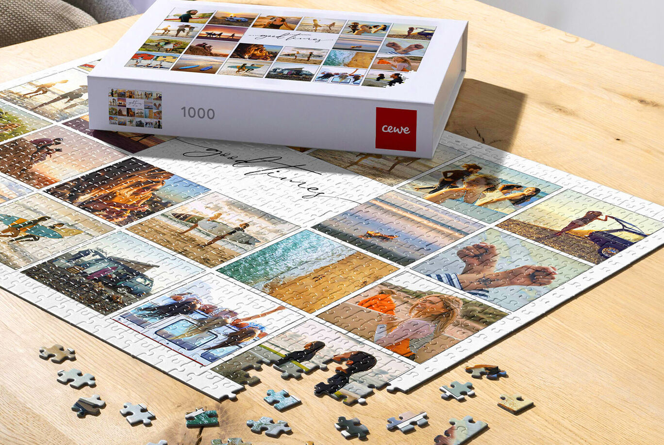 Puzzle with 1000 pieces on a table, surrounded by pieces and a beautiful box with photos showing special moments, CEWE Puzzle